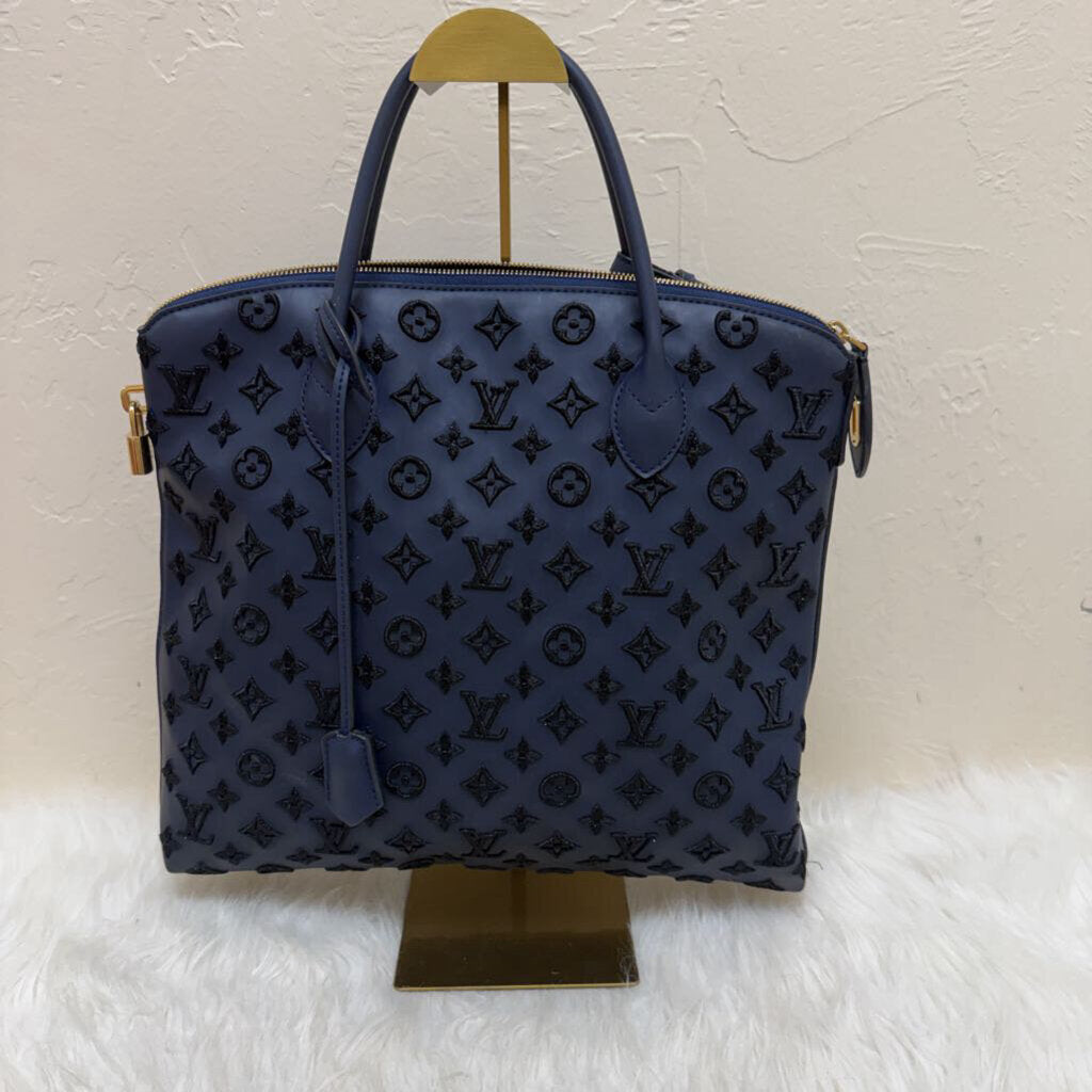 Limited Edition Monogram Addiction Vertical Lockit MM