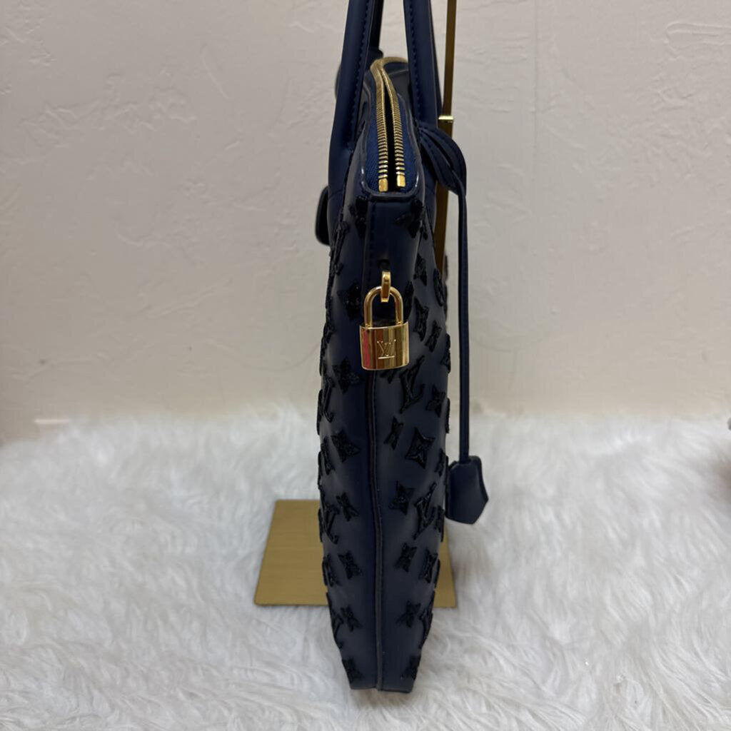 Limited Edition Monogram Addiction Vertical Lockit MM