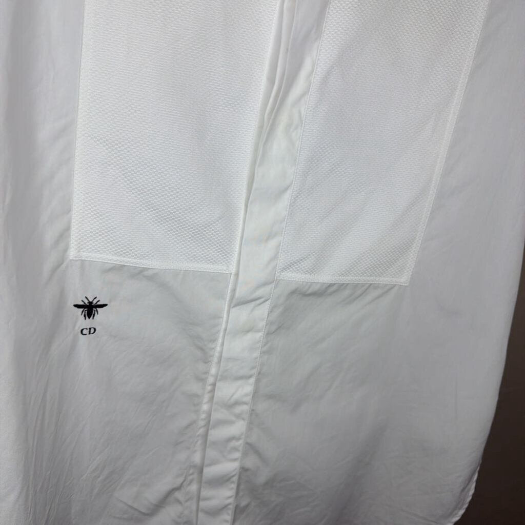 White Sleeveless Button Up