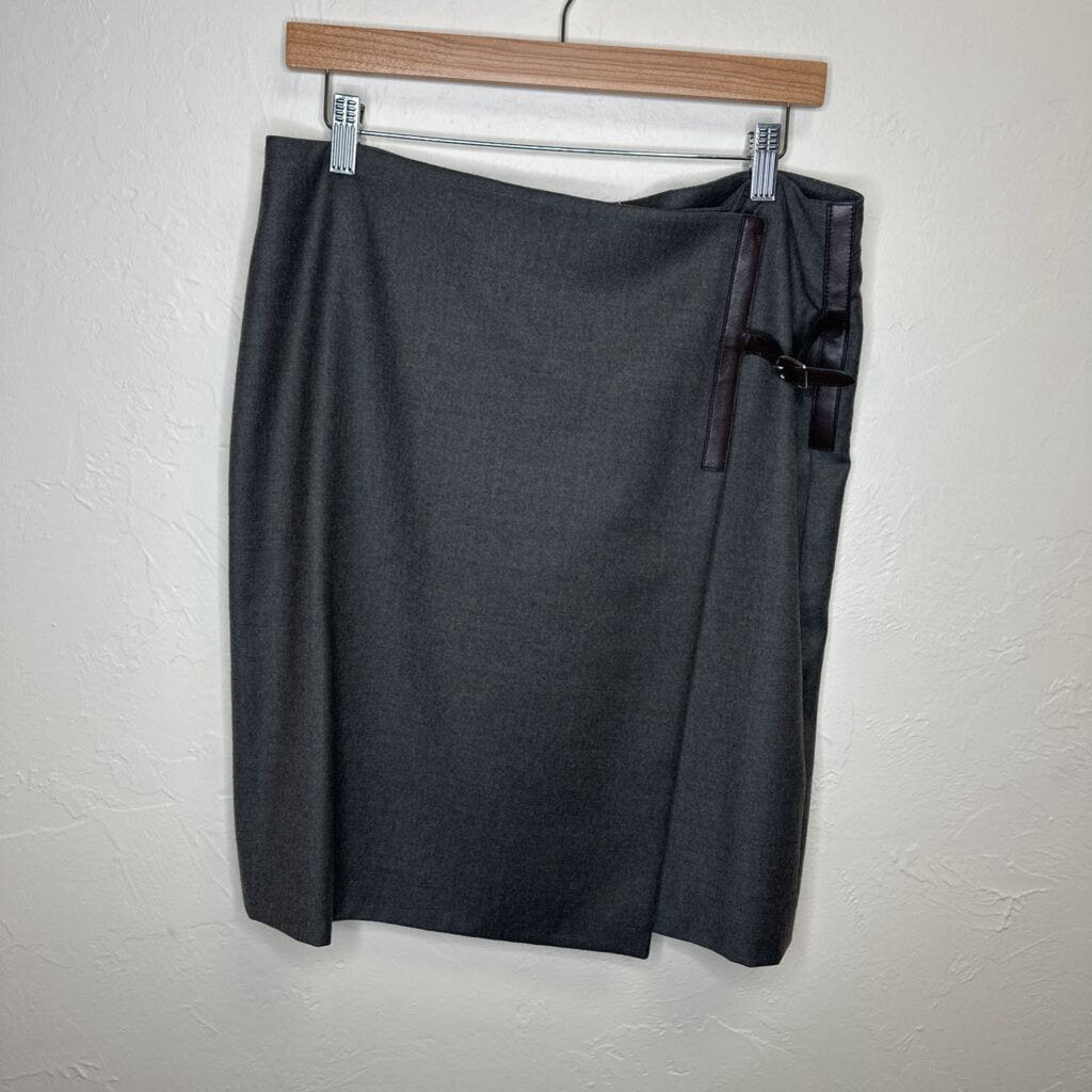 Mid length virgin wool skirt with leather belt accent