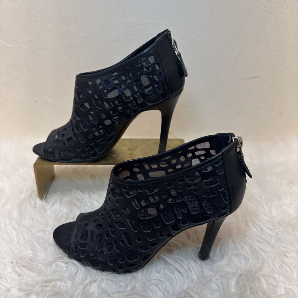 Black peeptoe cutout booties