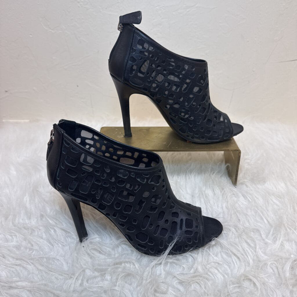 Black peeptoe cutout booties