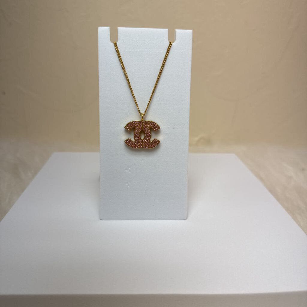 Coco Mark Pink Rhinestone Gold Necklace