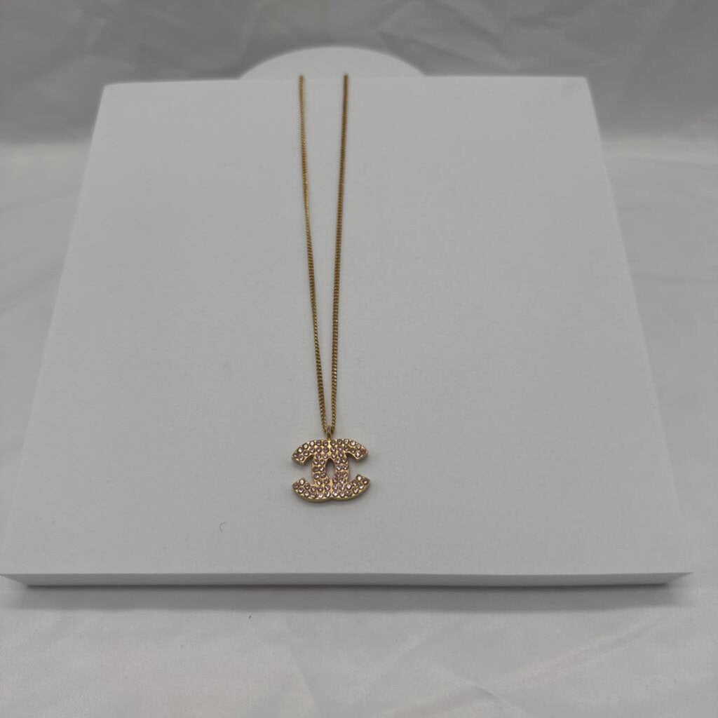 Coco Mark Pink Rhinestone Gold Necklace