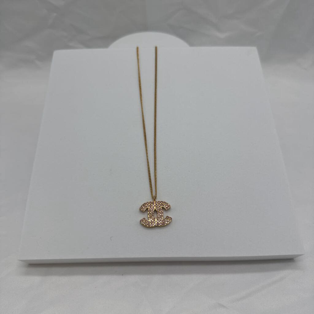 Coco Mark Pink Rhinestone Gold Necklace