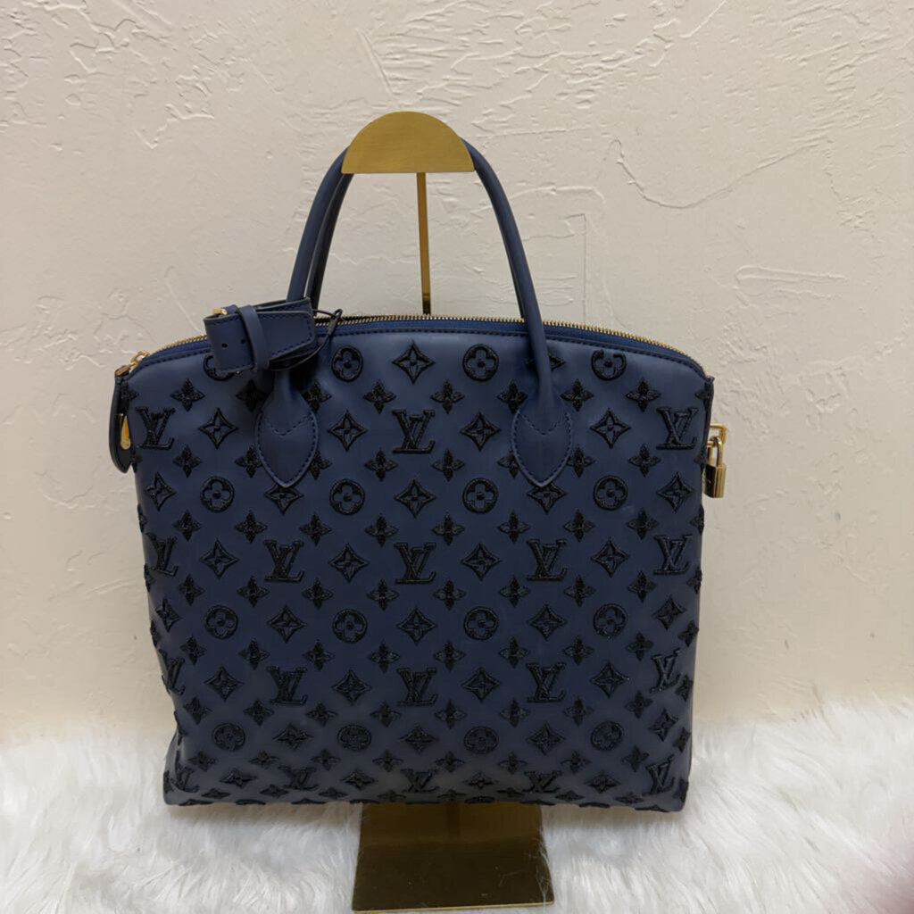 Limited Edition Monogram Addiction Vertical Lockit MM