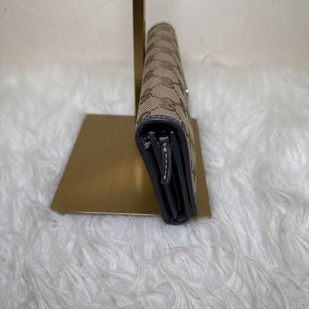 Britt Continental Wallet in GG Monogram Canvas